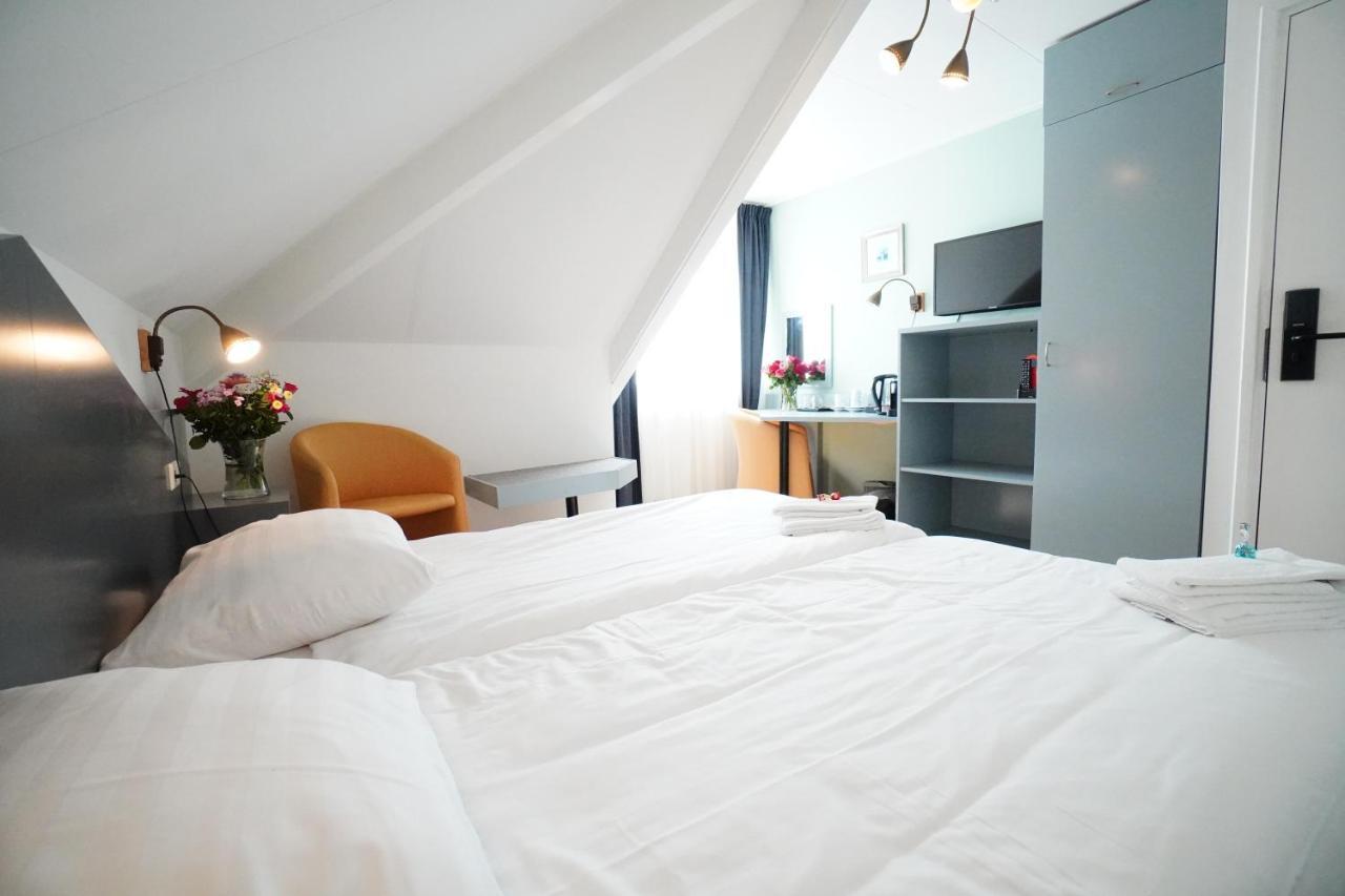 Hotel Brasserie Den Burg Rom bilde