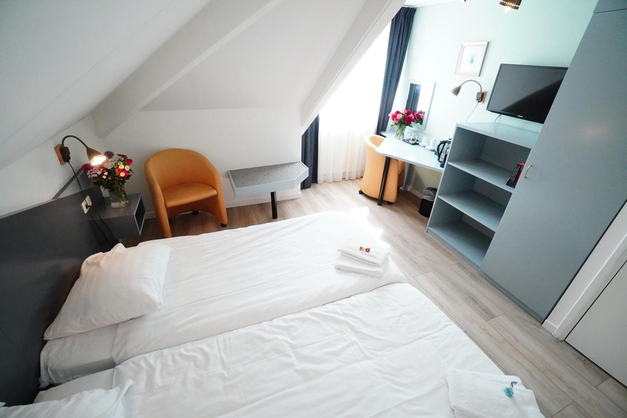 Hotel Brasserie Den Burg Rom bilde