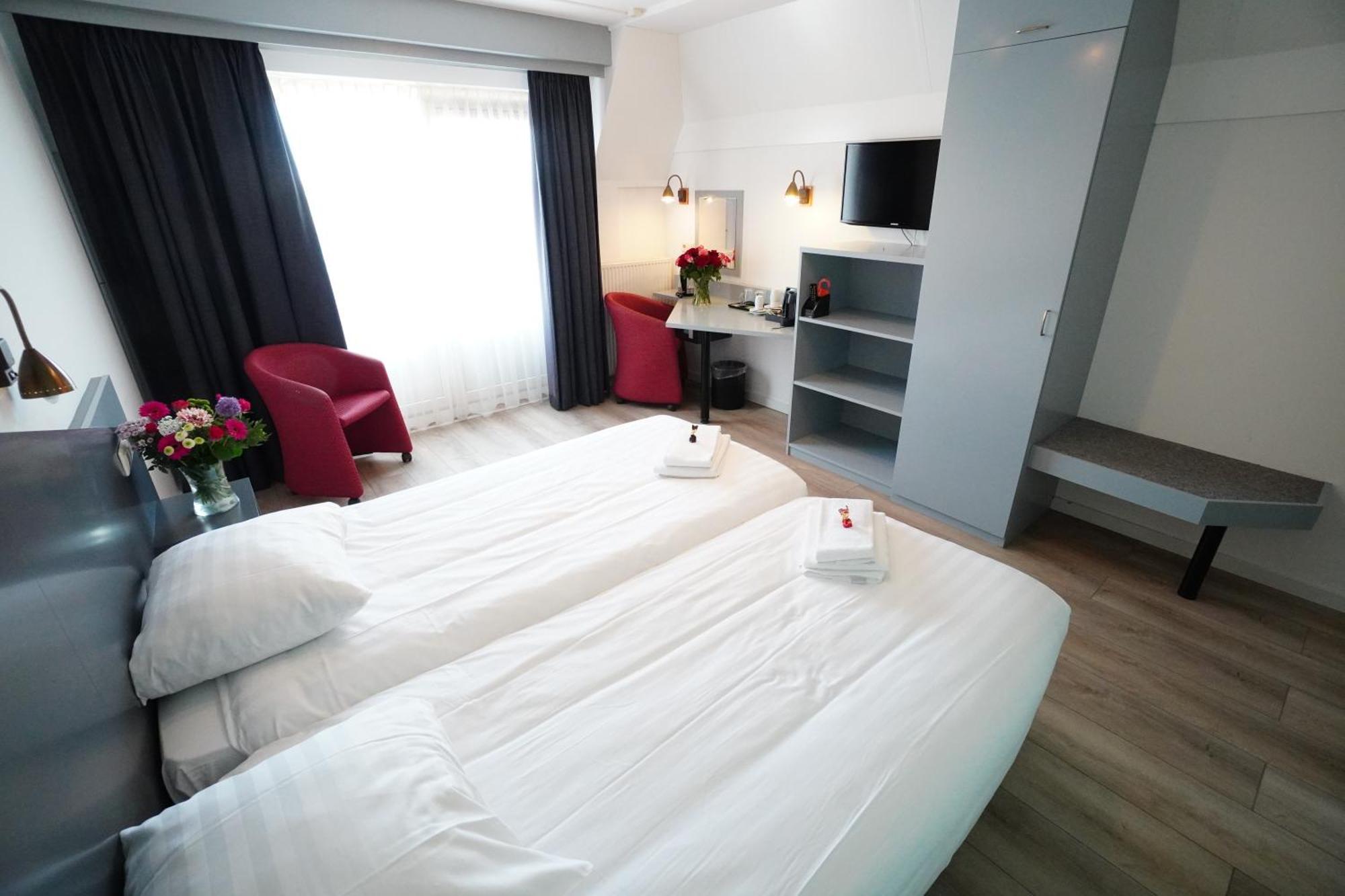 Hotel Brasserie Den Burg Rom bilde